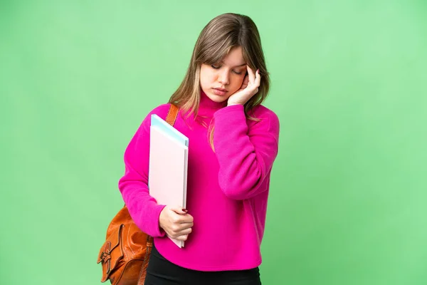 Junge Studentin Über Isolierten Chroma Schlüsselhintergrund Mit Kopfschmerzen — Stockfoto