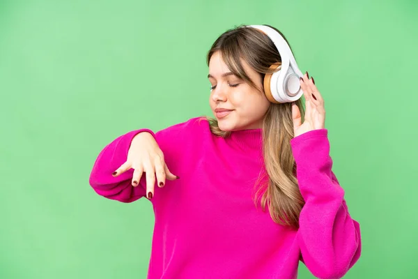 Chica Joven Sobre Aislado Croma Clave Fondo Escuchar Música Bailar — Foto de Stock