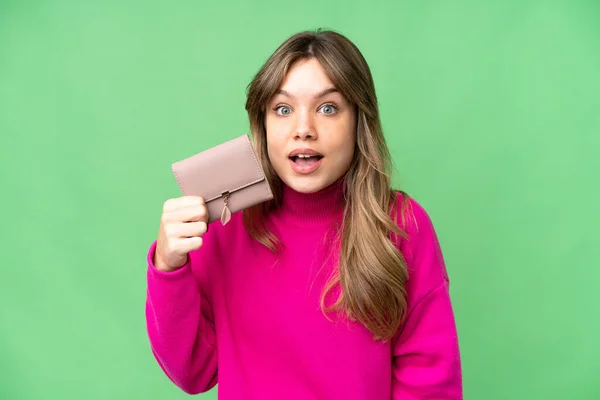 Young Girl Holding Wallet Isolated Chroma Key Background Surprise Shocked — Stock Photo, Image