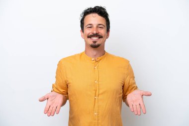 Young man with moustache isolated on white background happy and smiling