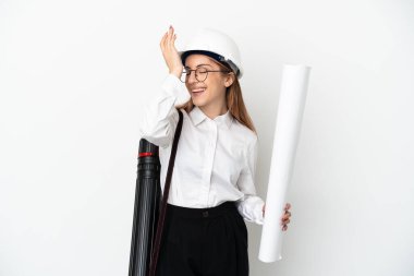 Young architect woman with helmet and holding blueprints isolated on white background has realized something and intending the solution