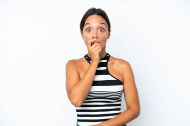 Young hispanic woman isolated on white background surprised and shocked while looking right