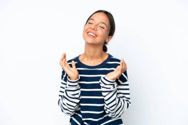 Young hispanic woman isolated on white background smiling a lot