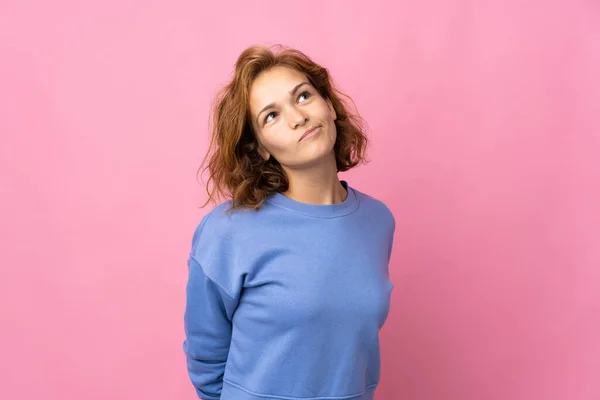 Young Georgian Woman Isolated Pink Background Looking — Stockfoto