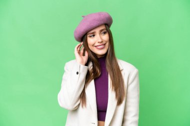 Young beautiful woman over isolated chroma key background thinking an idea