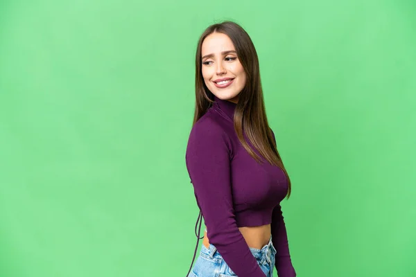 Young Beautiful Woman Isolated Chroma Key Background Looking Side Smiling — Stock fotografie