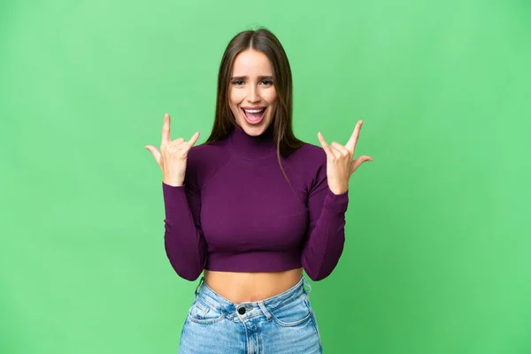 Young Beautiful Woman Isolated Chroma Key Background Making Horn Gesture — Stock Fotó