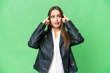 Young beautiful woman over isolated chroma key background having doubts and thinking