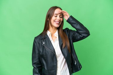 Young beautiful woman over isolated chroma key background smiling a lot