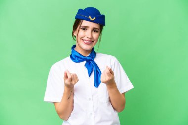 Airplane stewardess over isolated chroma key background making money gesture
