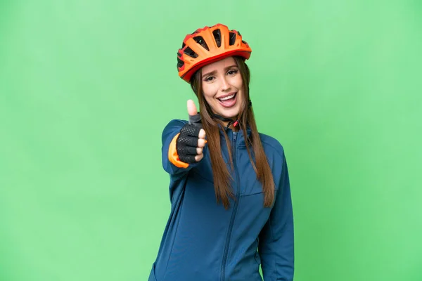 Young Cyclist Woman Isolated Chroma Key Background Thumbs Because Something — Stockfoto