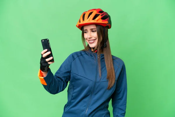 Young Cyclist Woman Isolated Chroma Key Background Making Selfie — 스톡 사진