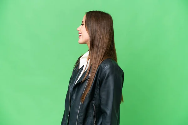Young Beautiful Woman Isolated Chroma Key Background Laughing Lateral Position — Stock fotografie