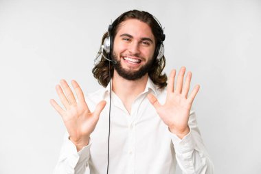 Telemarketer man working with a headset over isolated white background counting ten with fingers