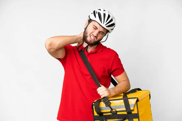 Young delivery man with thermal backpack over isolated white background with neckache