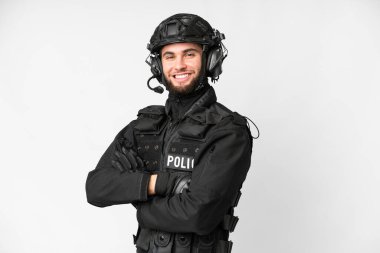 SWAT over isolated white background with arms crossed and looking forward