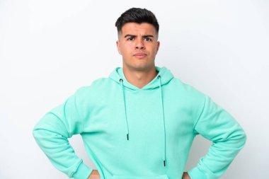 Young caucasian handsome man isolated on white background angry