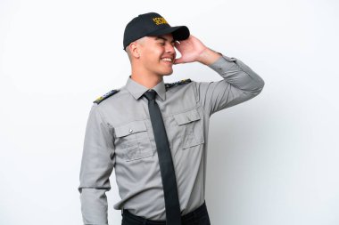 Beyaz arka planda izole genç beyaz güvenlik bir şeyi fark etti ve çözüme niyetlendi.