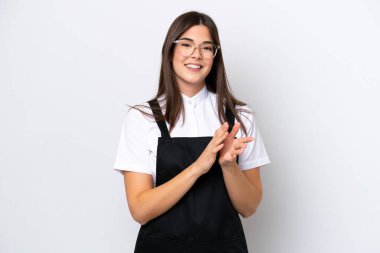 Restaurant Brazilian waiter woman isolated on white background applauding after presentation in a conference