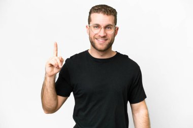 Young handsome blonde man over isolated white background pointing up a great idea