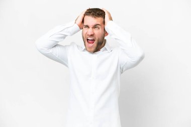 Young handsome blonde man over isolated white background stressed overwhelmed