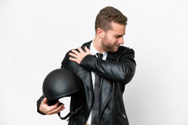 Business man with a motorcycle helmet over isolated white background suffering from pain in shoulder for having made an effort