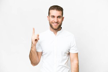 Young handsome blonde man over isolated white background showing and lifting a finger in sign of the best