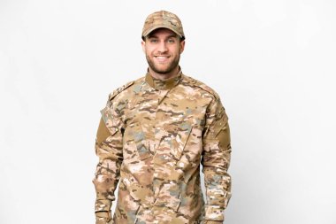 Military man over isolated white background laughing