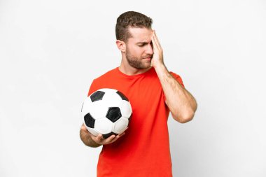 Handsome young football player man over isolated white background with headache