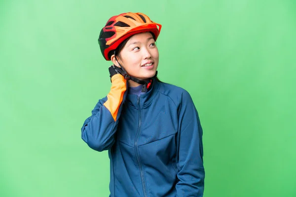 Young Cyclist Woman Isolated Chroma Key Background Thinking Idea — 스톡 사진