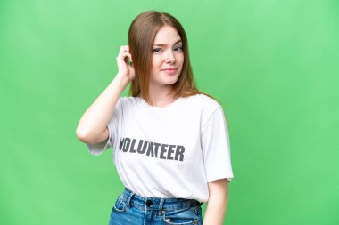 Young volunteer woman over isolated chroma key background having doubts