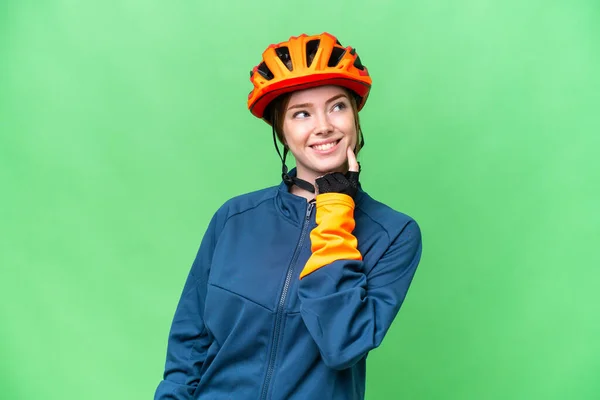 Young Cyclist Woman Isolated Chroma Key Background Thinking Idea While — Stockfoto