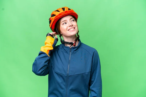 Young Cyclist Woman Isolated Chroma Key Background Thinking Idea — Stockfoto