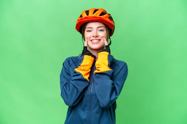 Young Cyclist Woman Isolated Chroma Key Background Smiling Happy Pleasant — Stockfoto