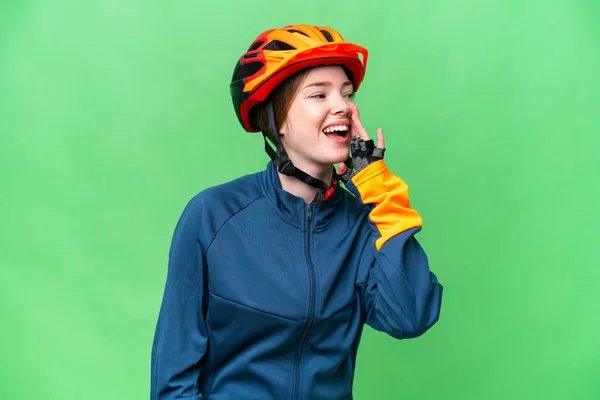 Young Cyclist Woman Isolated Chroma Key Background Shouting Mouth Wide — Stockfoto