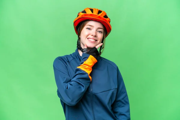 Young Cyclist Woman Isolated Chroma Key Background Smiling — Stockfoto