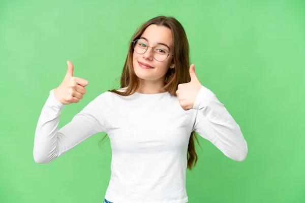 Teenager Girl Isolated Chroma Key Background Giving Thumbs Gesture — Stockfoto