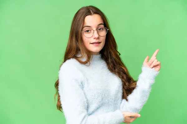 Teenager Girl Isolated Chroma Key Background Happy Pointing — Stok fotoğraf