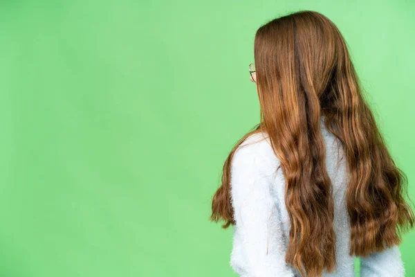 Teenager Girl Isolated Chroma Key Background Back Position Looking Back — Stock fotografie