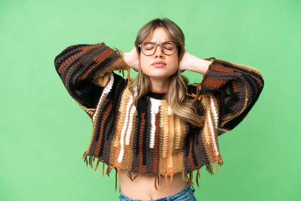 stock image Young girl over isolated chroma key background frustrated and covering ears