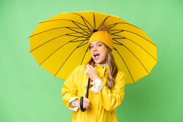 Young Girl Rainproof Coat Umbrella Isolated Chroma Key Background Celebrating — Stock Photo, Image