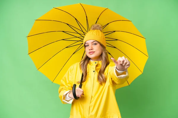Young Girl Rainproof Coat Umbrella Isolated Chroma Key Background Giving — Stock Photo, Image