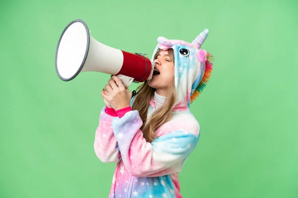 Young Girl Unicorn Pajamas Isolated Chroma Key Background Shouting Megaphone — Stock Photo, Image