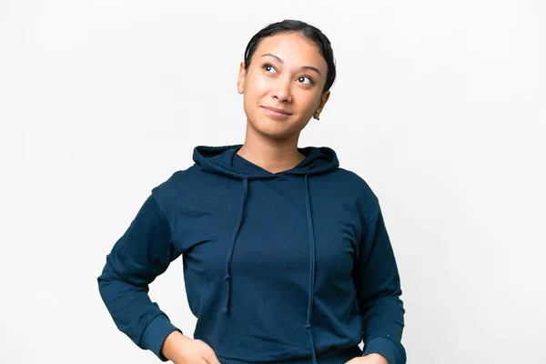 stock image Young Uruguayan woman over isolated white background thinking an idea while looking up