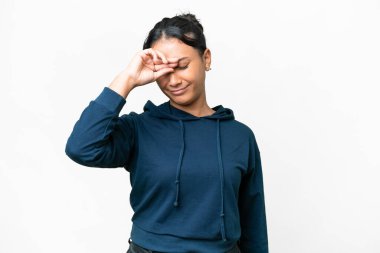 Young Uruguayan woman over isolated white background with tired and sick expression