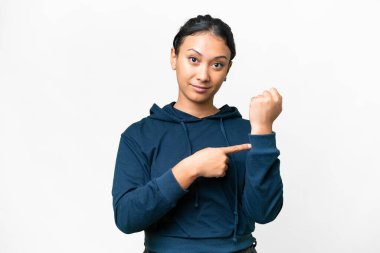 Young Uruguayan woman over isolated white background making the gesture of being late
