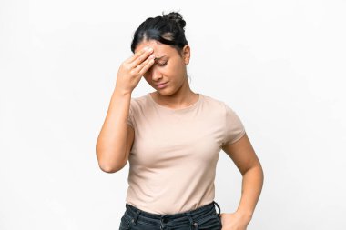 Young Uruguayan woman over isolated white background with headache