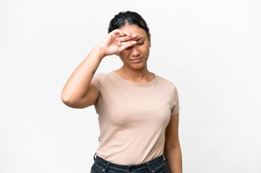 Young Uruguayan woman over isolated white background with tired and sick expression