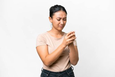 Young Uruguayan woman over isolated white background suffering from pain in hands