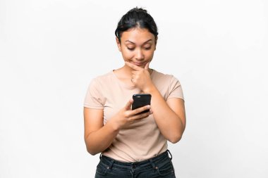 Young Uruguayan woman over isolated white background thinking and sending a message